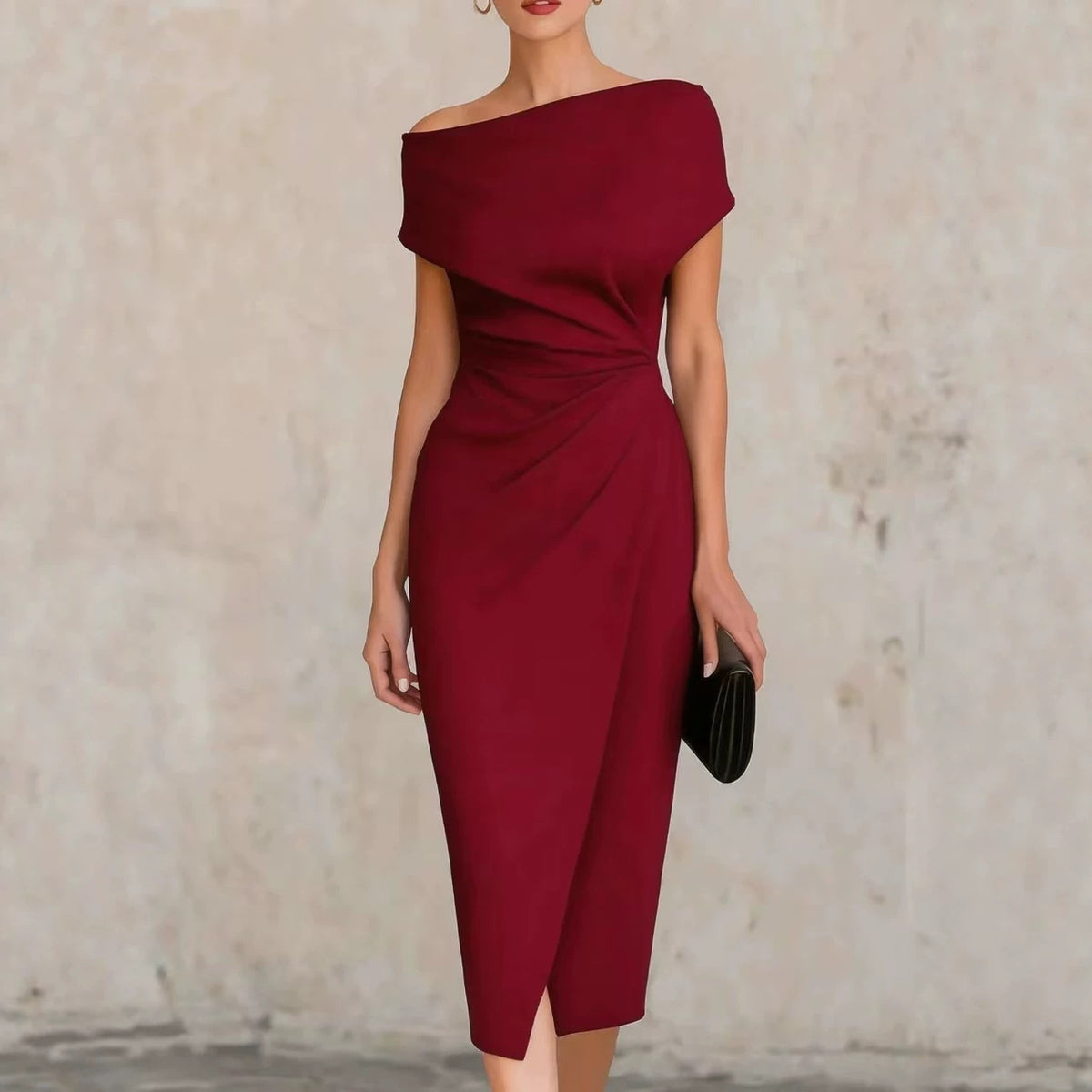 Vestido midi asimétrico · un hombro y drapeado