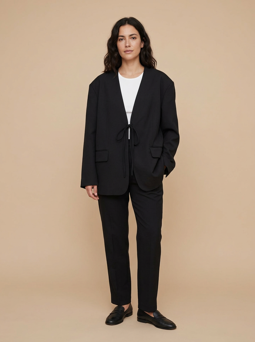 Chaqueta blazer con lazo · imagen generada con IA